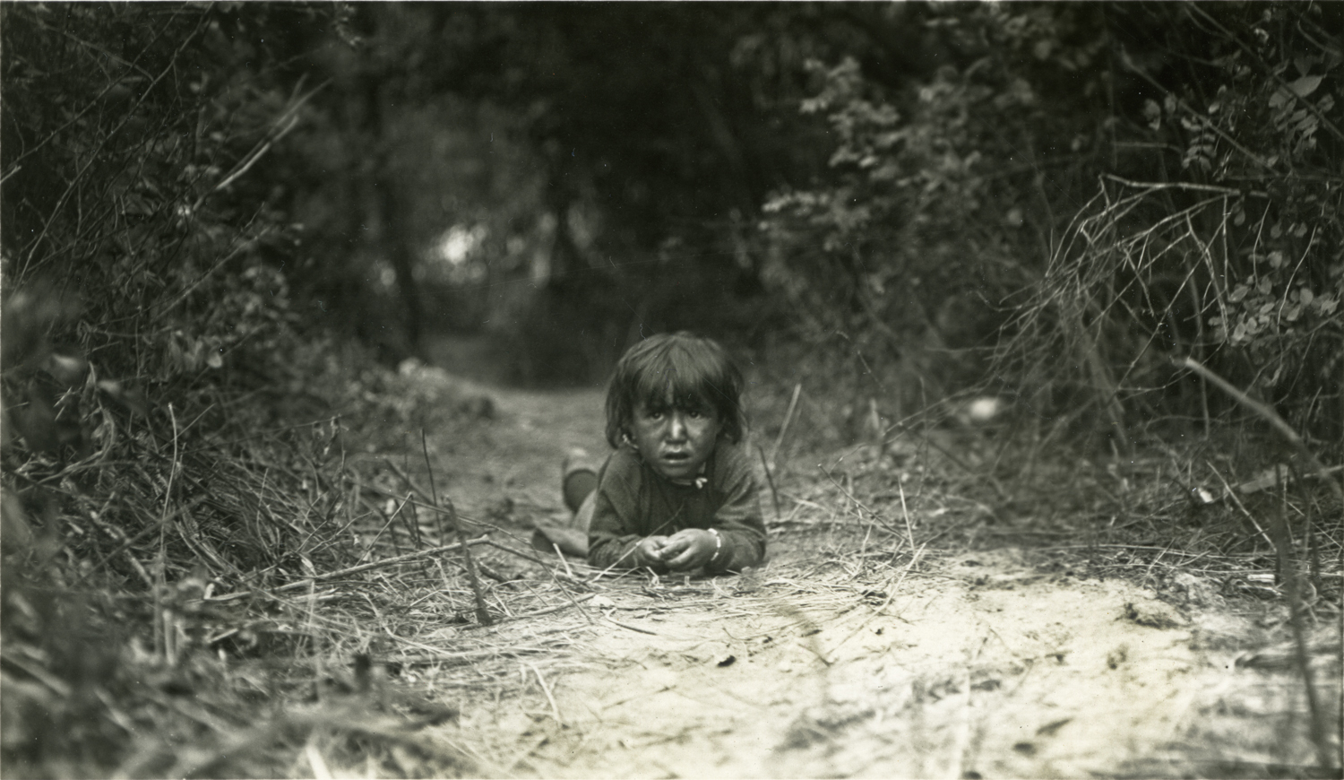 An Indian Boy in the Trail, Crow Reservation, Montana, 1909.  Photograph by Joseph Dixon.  Courtesy of the Mathers Museum, Wanamaker Collection,  Bloomington, I.N., W-2394.