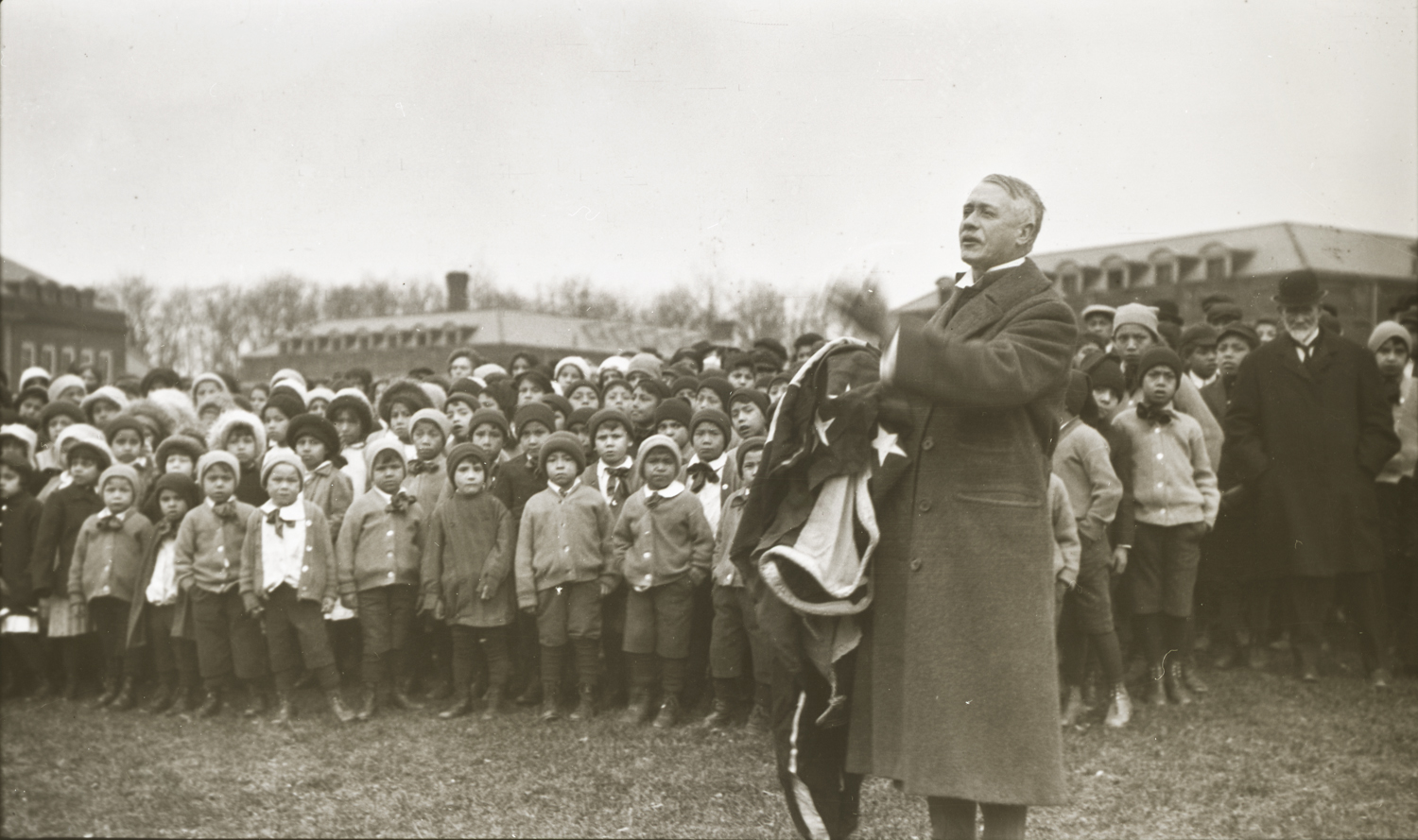 Thomas Indian School Children Listening to Dr. Dixon, November 28, 1913. Photograph by Joseph Dixon. Courtesy of the Mathers Museum of World Cultures, Wanamaker Collection, Indiana University, Bloomington, I.N., W-4311.
