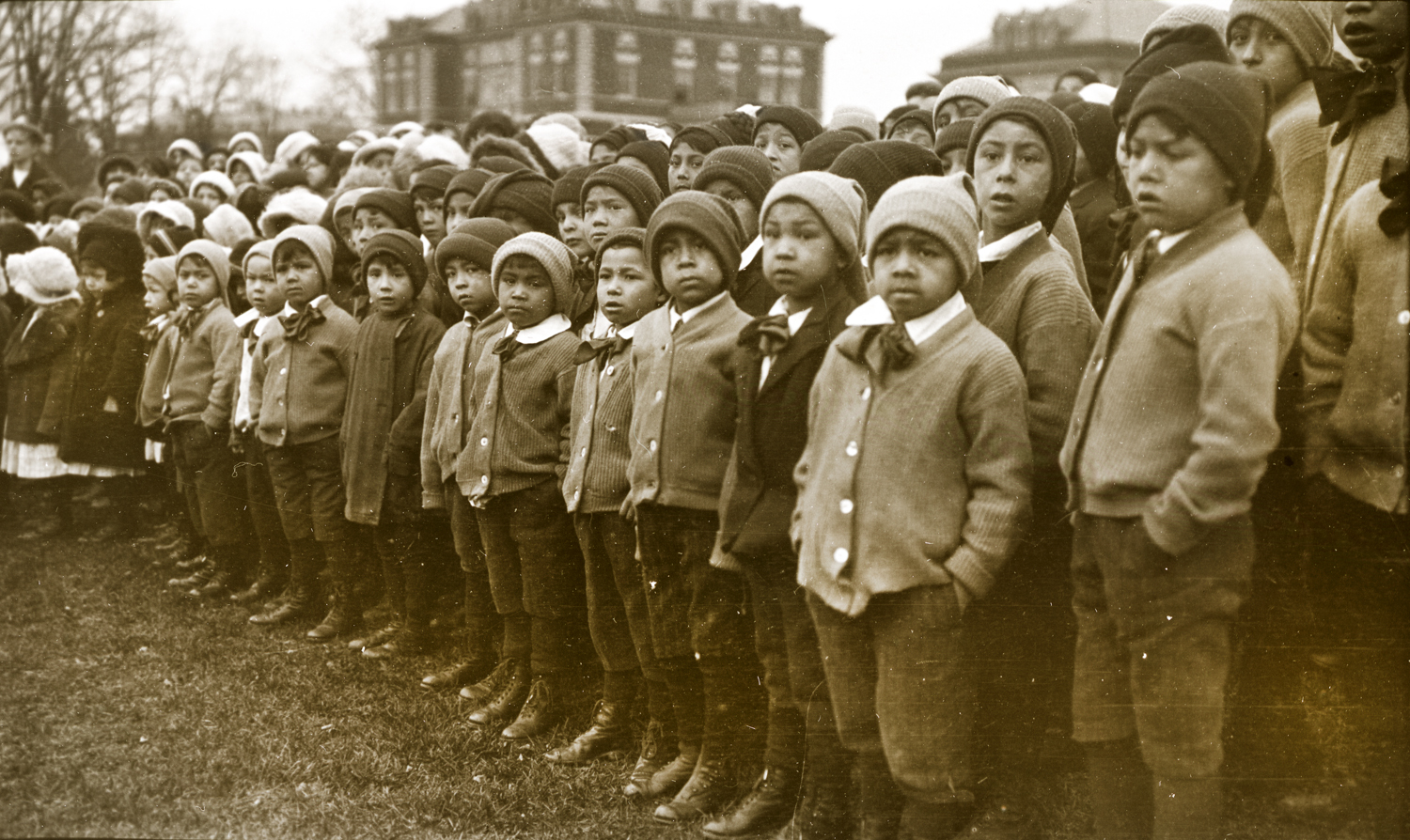 Thomas Indian School Children at Flag Raising Ceremony, November 28, 1913. Photograph by Joseph Dixon. Courtesy of the Mathers Museum of World Cultures, Wanamaker Collection, Indiana University, Bloomington, I.N., W-4312.